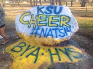 Kent State cheerleading has a nationals tradition. They paint the school rock before leaving to compete! This is the rock at Kent State that is often painted by sports teams and other on campus clubs!